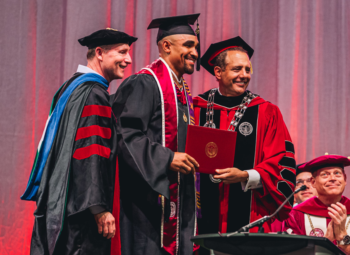 Hurts earned his second degree in May, a master’s in human relations.